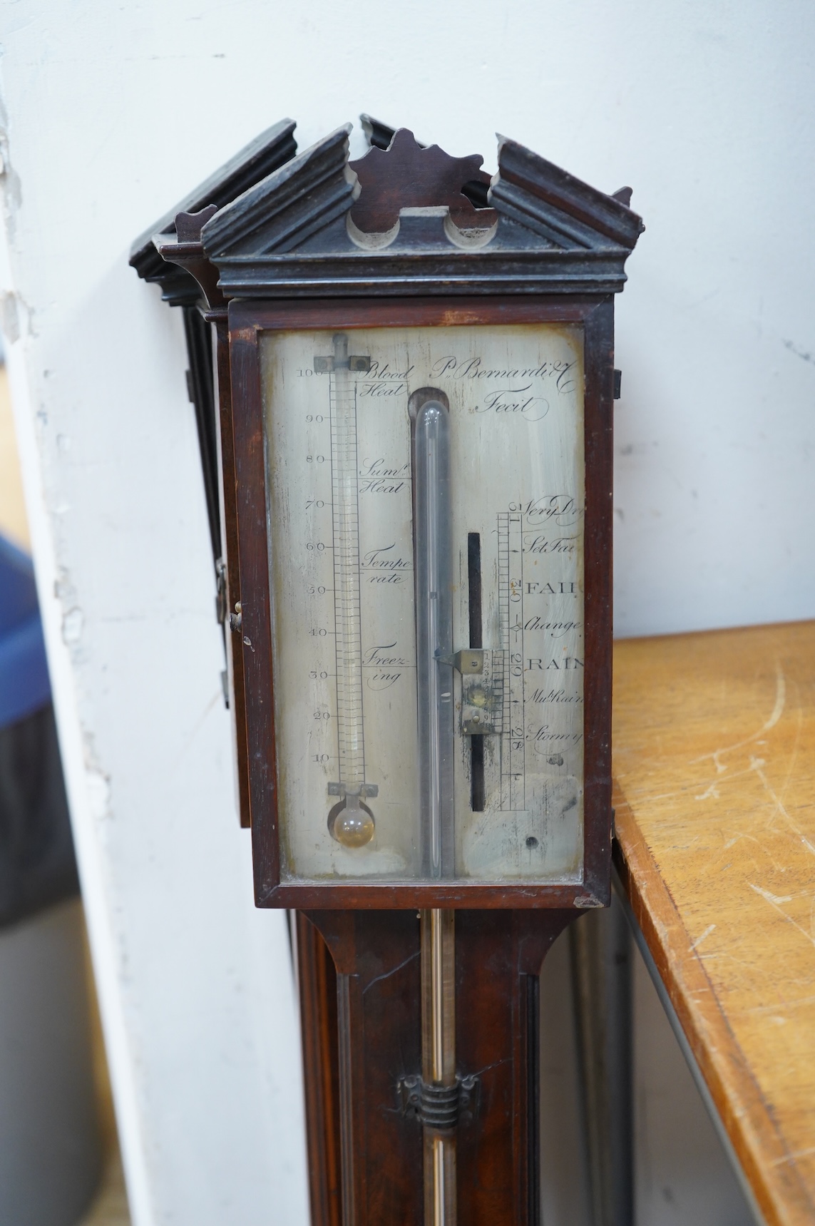 Three George III stick mahogany barometers, one inscribed P Bernardi & Co., 97.5cm high